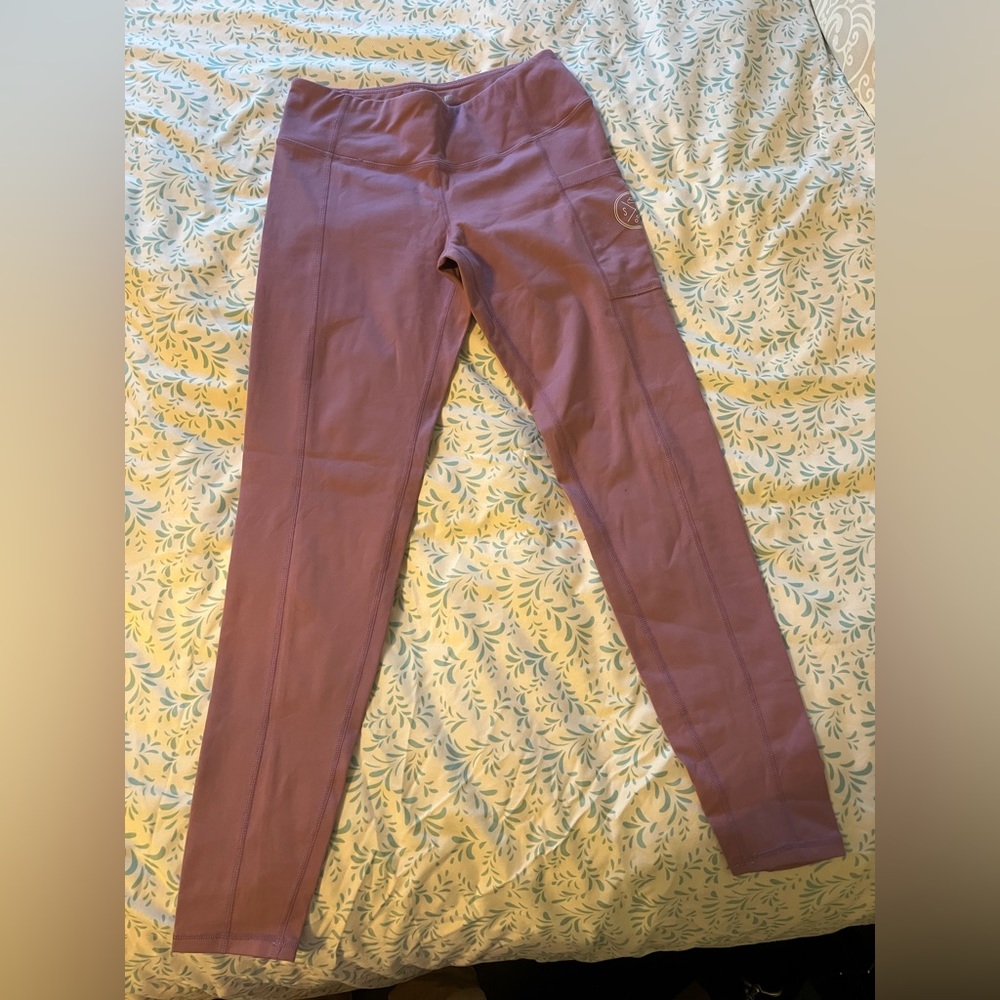 Sand Cloud eco pocket leggings in a pretty pink/purple color